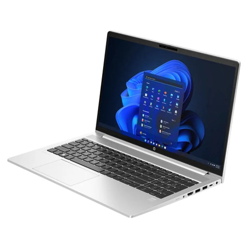 HP ProBook 455 G10 open on desk with Windows 11 interface and backlit keyboard visible
