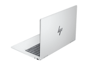 White HP laptop on a green background