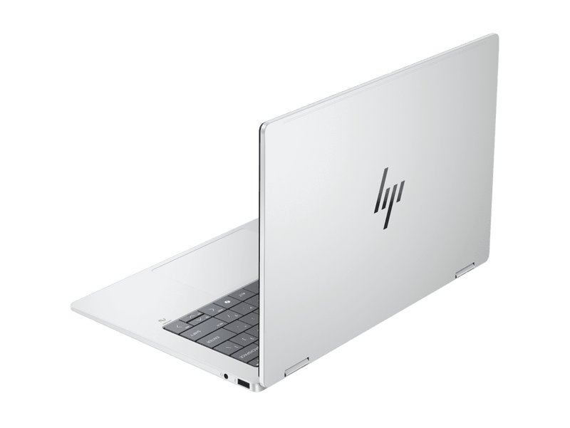 White HP laptop on a green background