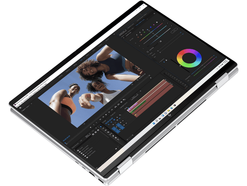 Laptop displaying video editing software with a color wheel and interface on a transparent background