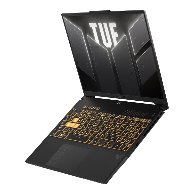 A TUF Gaming F16, with the lid open and TUF Gaming logo on screen, floating above a desolate landscape