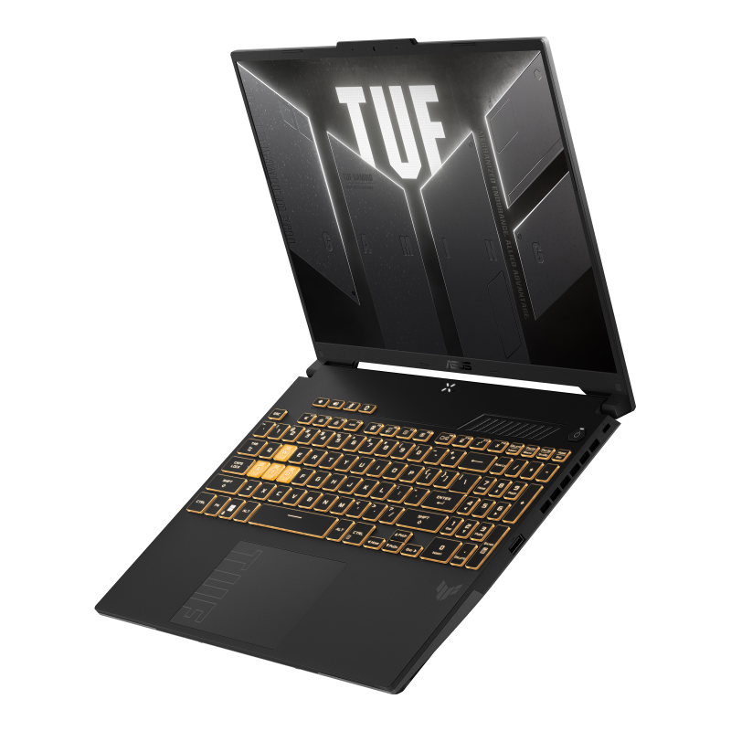 A TUF Gaming F16, with the lid open and TUF Gaming logo on screen, floating above a desolate landscape