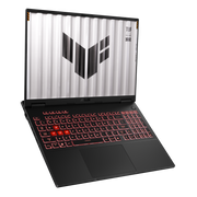 A TUF Gaming A16 (2024), with the lid open and TUF Gaming logo on screen, floating above a desolate landscape